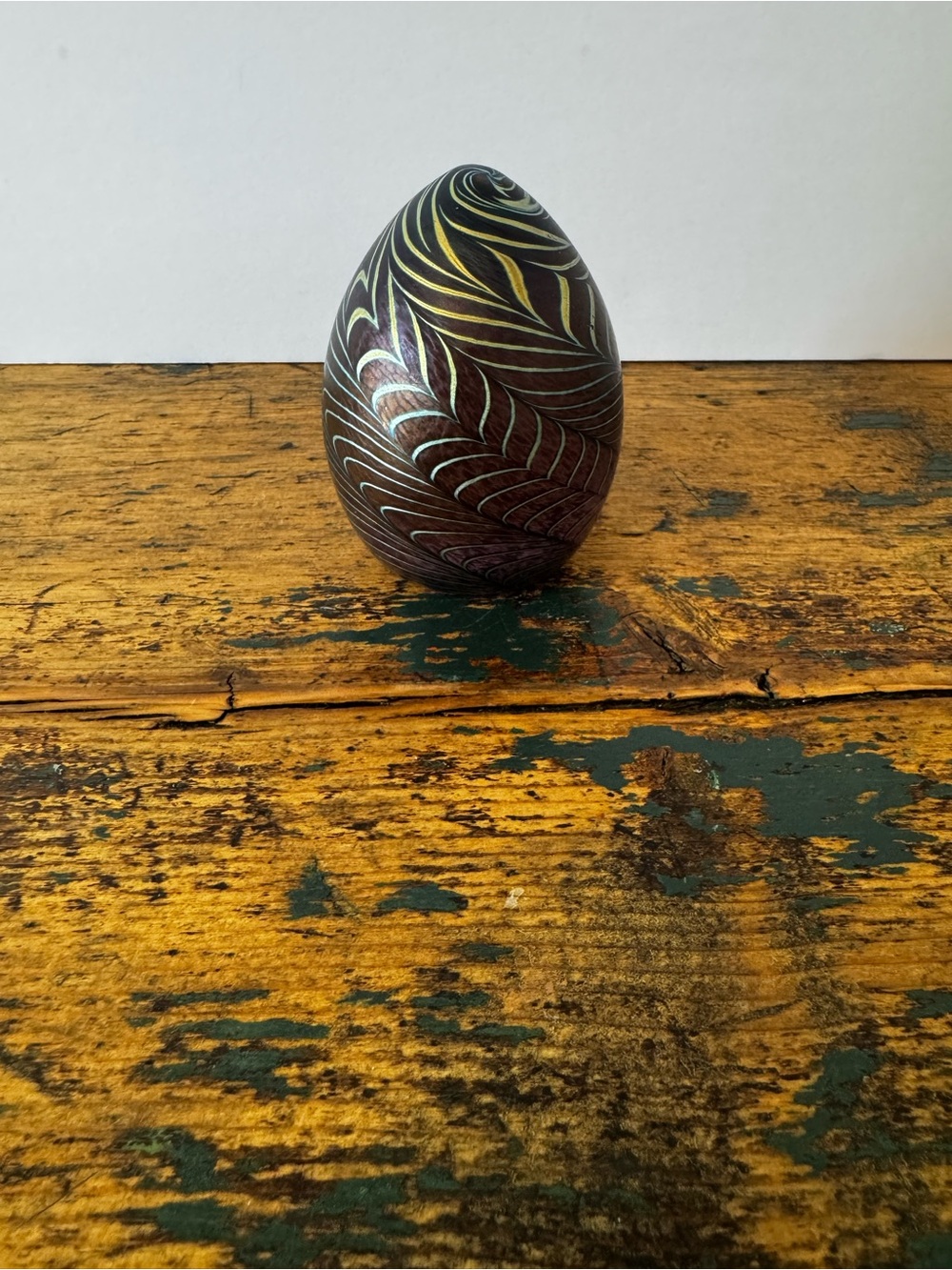 Decorative Egg Paperweight with Gold and Blue Swirl Accents